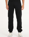 Close up shot of men's tracksuit bottoms in black