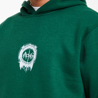 close up of emerald co ord sets men logo on chest