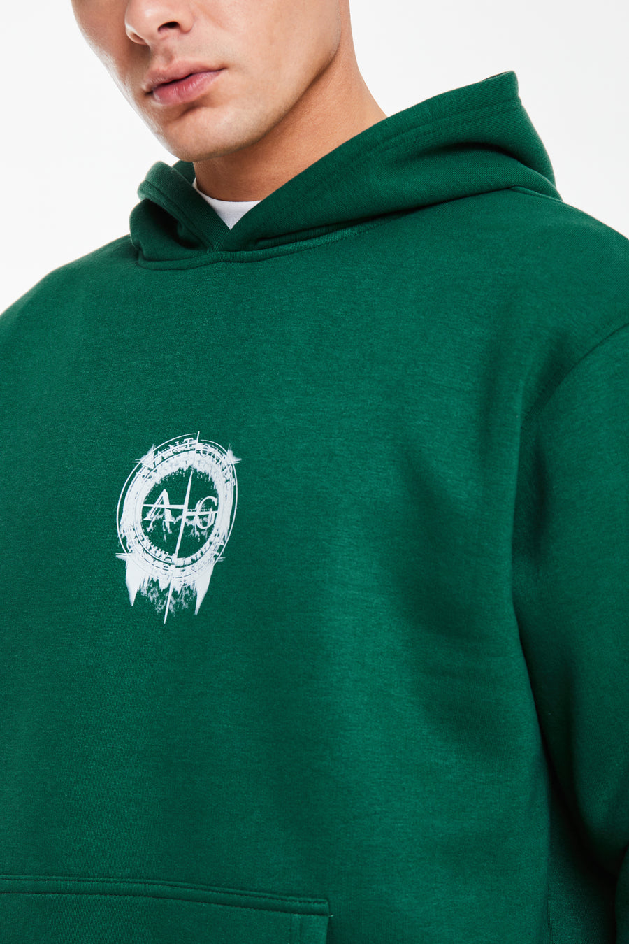 close up of emerald co ord sets men logo on chest