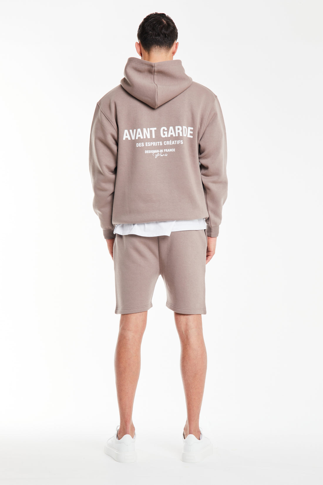 back profile of mens hoodie in minx brown with 'avant garde paris' logo