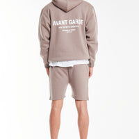 back profile of mens hoodie in minx brown with 'avant garde paris' logo
