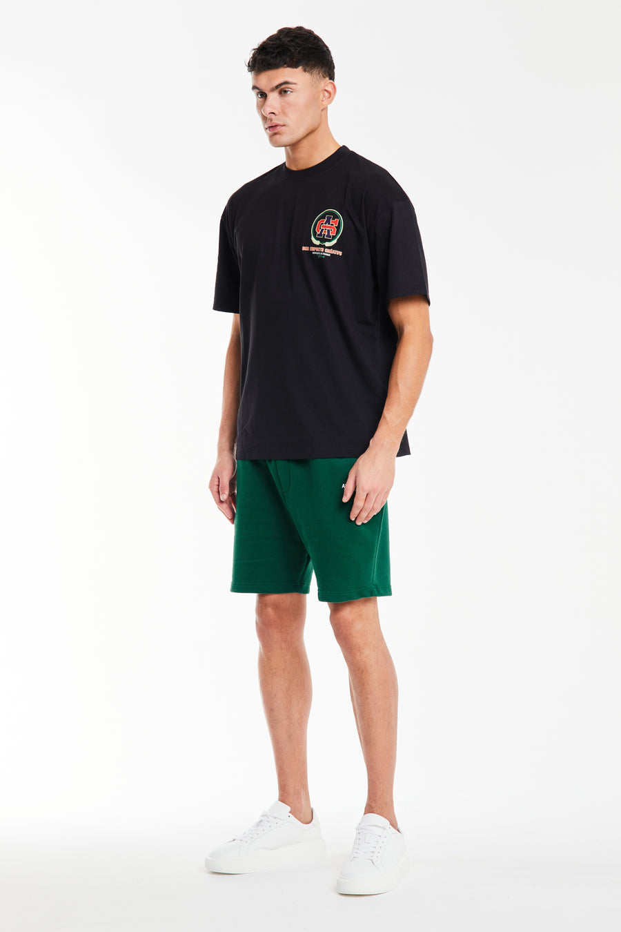 black -shirt for men styled with shorts