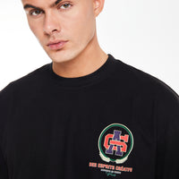 Close up of black t shirt for men 'Avant Garde' logo on chest