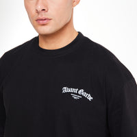 Close up of 'Avant Garde' logo on a black t shirt sale