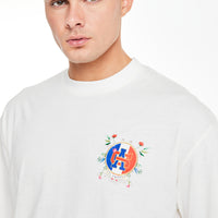 close up of white t shirt on sale logo on chest