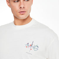 White men's t shirt showing close up of 'Avant Garde Paris' graphic logo 