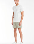 model wearing men's utility shorts with white polo