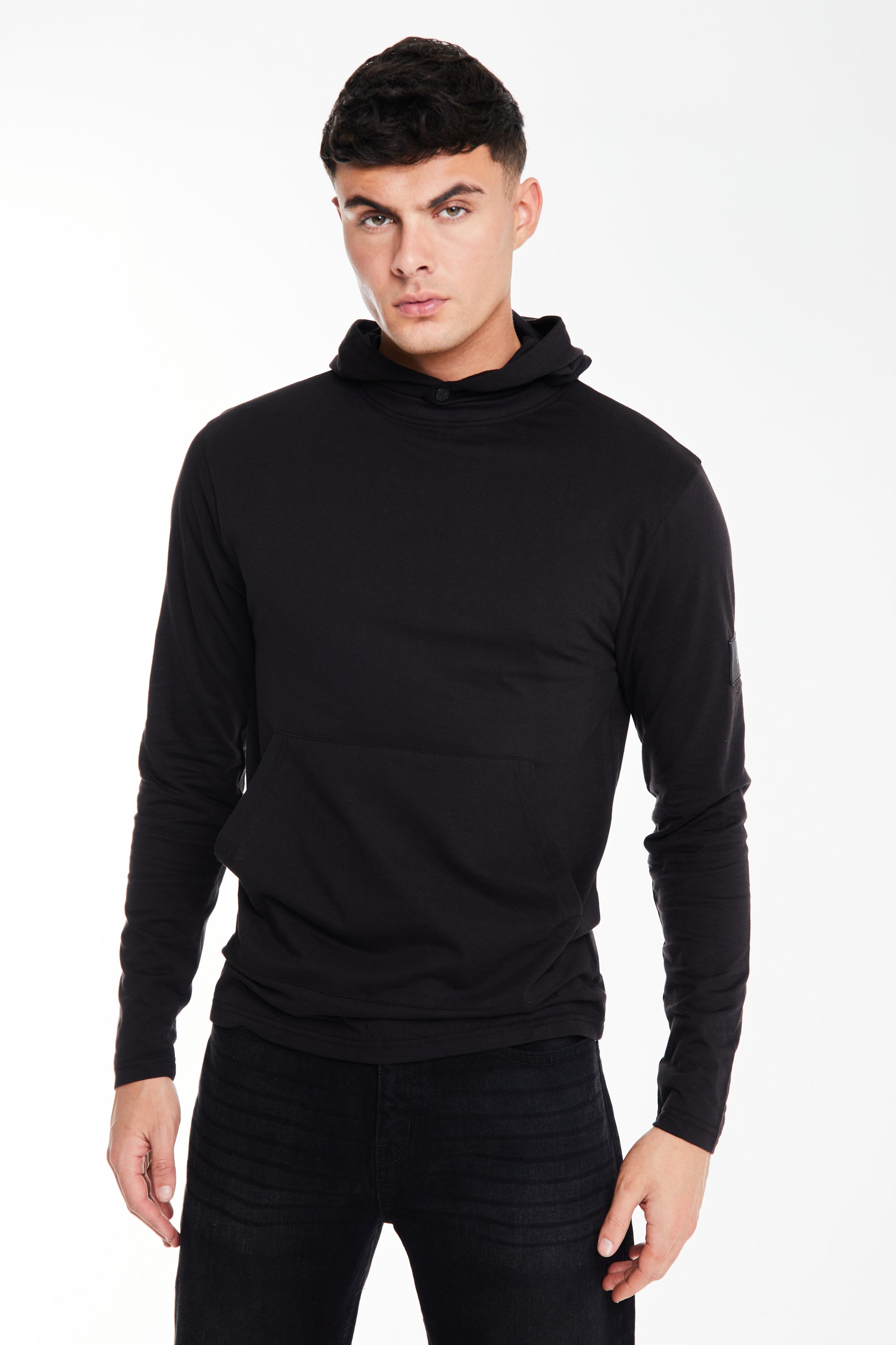 Model wearing &#39;Collusive&#39; hoodie sale top in black