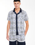 Men's twin set clothing with patterns in white and dark blue