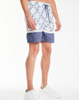 side profile of the shorts in a mens co ord with a baby blue pattern