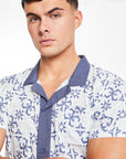 detailed veiw of the blue and white pattern on a men's twin set