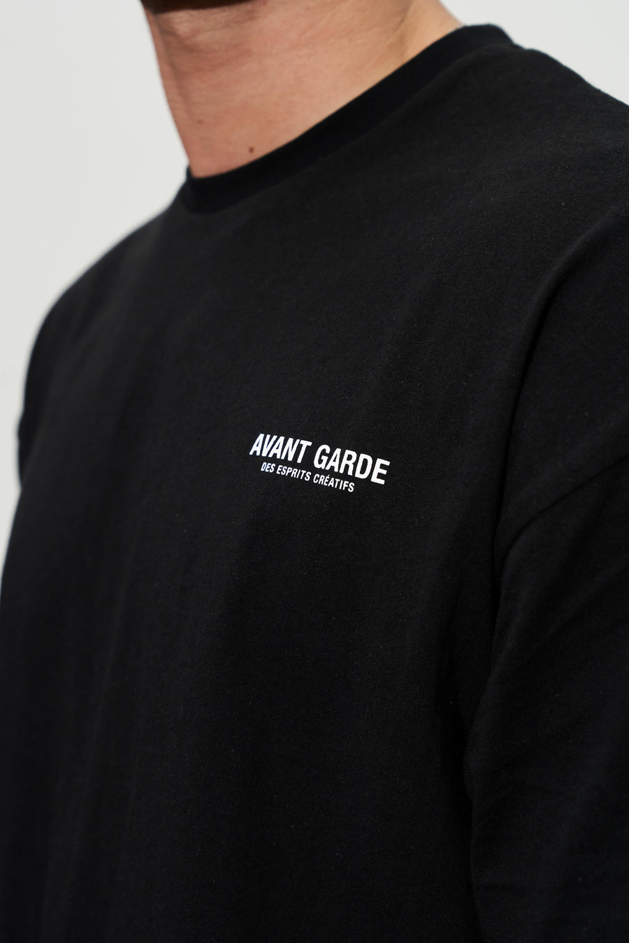 Small brand detail of mens black t-shirt