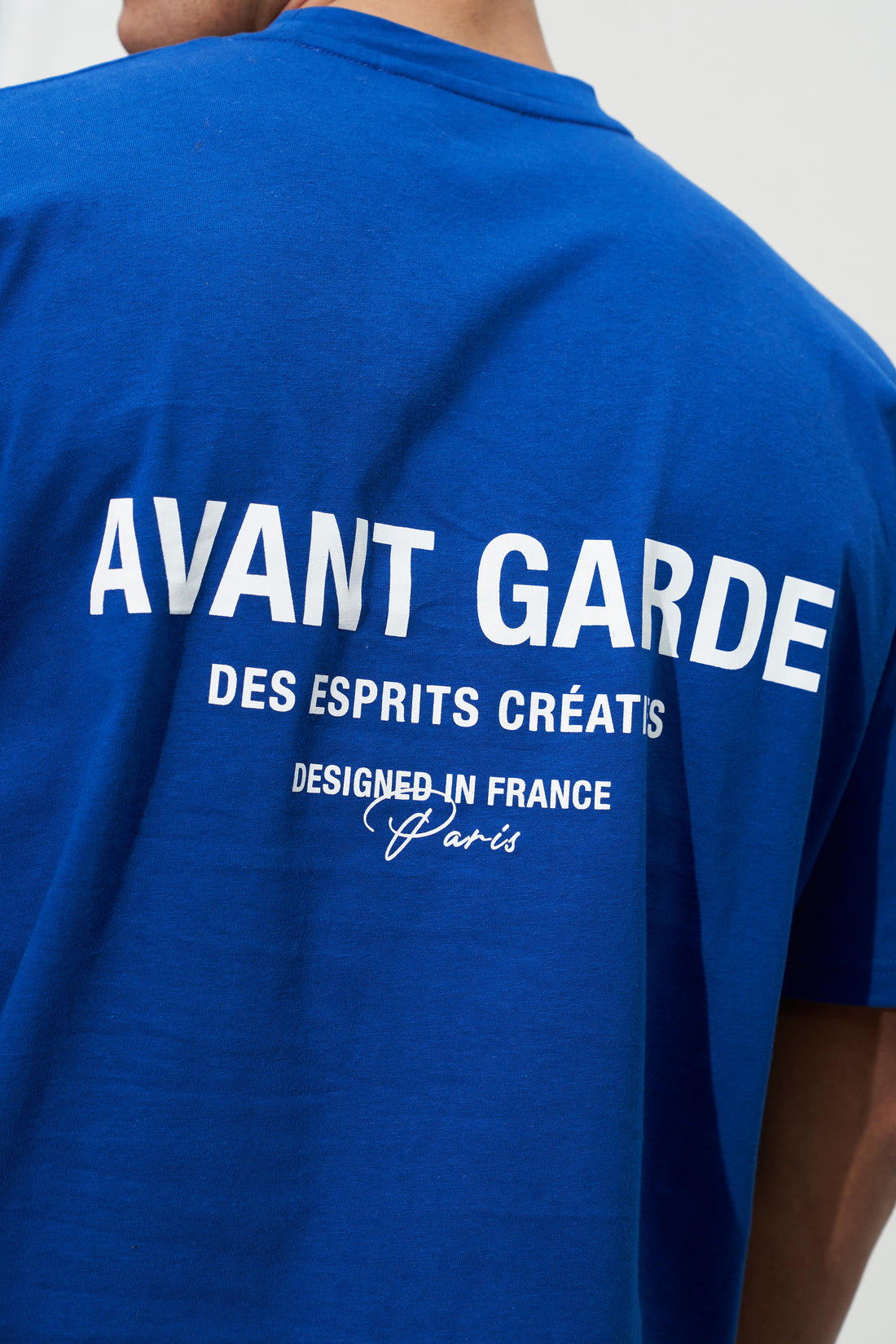 Back branding of royal blue Avant Garde T-shirt